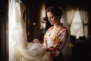 Bride checking her dress in Smyrna, DE